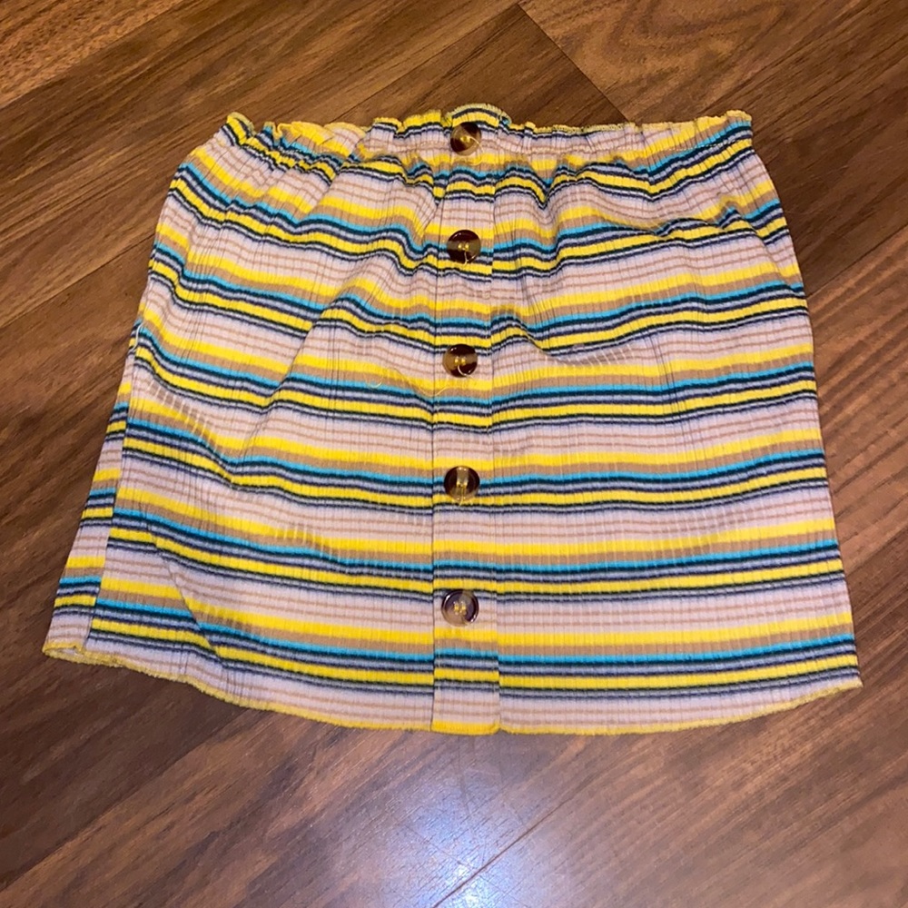 A striped tube top with buttons